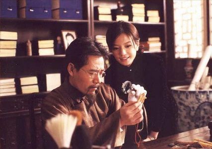 Baoguo Chen and Wei Zhao in Moment in Peking (2005)