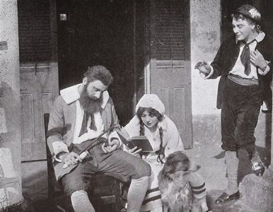 Stuart Holmes, Tom Moore, and Lottie Pickford in The Pilgrimage (1912)