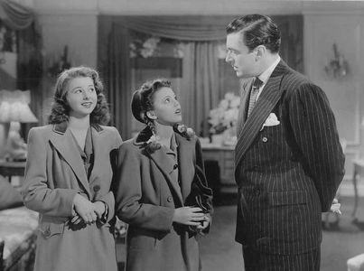 Walter Pidgeon, Jean Porter, and Virginia Weidler in The Youngest Profession (1943)