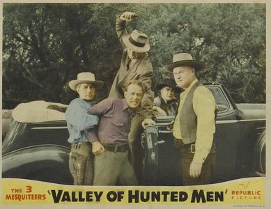 Kenne Duncan, Richard K. French, Arno Frey, and Roland Varno in Valley of Hunted Men (1942)