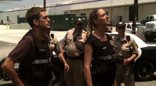 Lauren Lee Smith, Eric Szmanda, and Larry Mitchell in CSI: Crime Scene Investigation (2000)