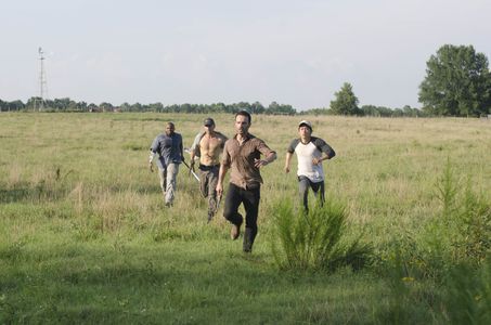 Andrew Lincoln, Jon Bernthal, Irone Singleton, and Steven Yeun in The Walking Dead (2010)