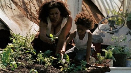 Scene from Benh Zeitlin's Beasts of the Southern Wild. Quevenzhane Wallis as Hushpuppy and Gina Montana as Miss Bathshee
