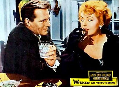 Arlene Dahl and Philip Carey in Wicked as They Come (1956)