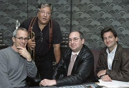 Composer James Newton Howard (left) and Latin jazz legend Arturo Sandoval (center left) collaborated with Sonnenfeld (ce