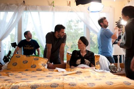 Lue as Lilly in Naked as We Came listening to Director Richard LeMay while crew sets up the next shot: