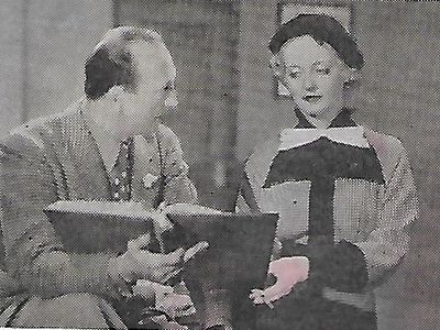 Bette Davis and Michael Curtiz in Front Page Woman (1935)