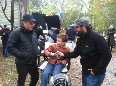 JP Vanderloo holding a snake on the set of Wish You Well with Cinematographer Frank Prinzi & Dakota Oher
