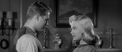 Sandra Dee and John Wilder in Until They Sail (1957)