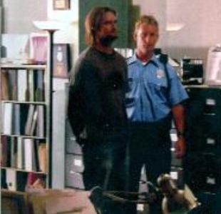 Arresting, detaining, and deporting Sawyer as the Sydney Cop in two episodes of Season 1 on the hit ABC TV series Lost i