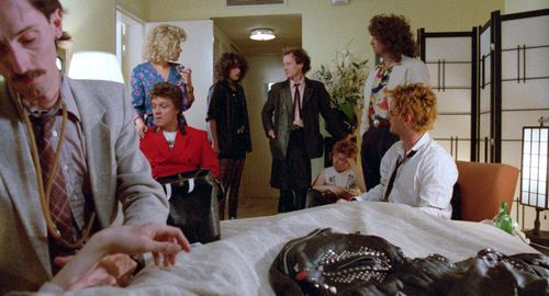 Perry Benson, David Hayman, Tony London, and Andrew Schofield in Sid and Nancy (1986)