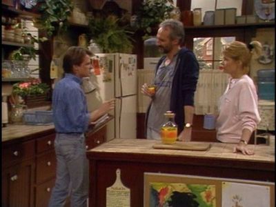 Michael J. Fox, Meredith Baxter, and Michael Gross in Family Ties (1982)
