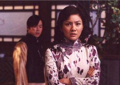 Yueming Pan and Ke Hu in Moment in Peking (2005)