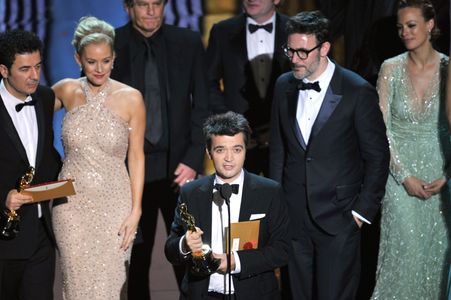 Penelope Ann Miller, Ludovic Bource, Michel Hazanavicius, and Thomas Langmann at an event for The 84th Annual Academy Aw