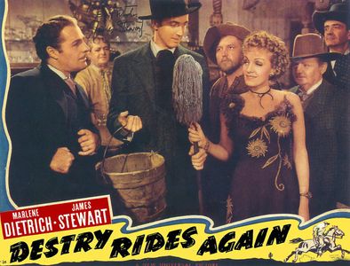 Marlene Dietrich, James Stewart, Brian Donlevy, and Warren Hymer in Destry Rides Again (1939)