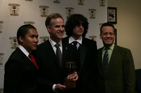 Dante Basco (l), Jack De Sena (3rd from l), Dee Bradley Baker (r) present Harley Jessup with the award for feature produ
