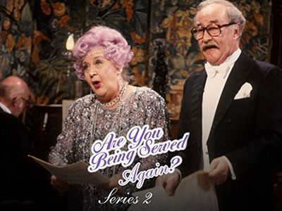 Mollie Sugden and Frank Thornton in Are You Being Served? Again! (1992)