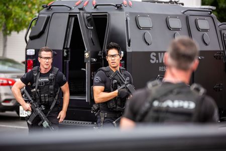 Michael Marc Friedman on the set of S.W.A.T. as Sgt. Becker with David Lim