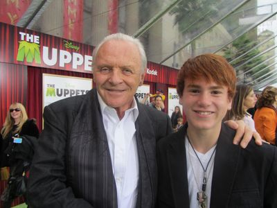 Justin Tinucci with Anthony Hopkins at the premiere of The Muppets November 12 2011 at the El Capitan Theatre, Hollywood