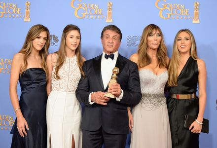 Sylvester Stallone, Jennifer Flavin, Sophia Rose Stallone, Sistine Rose Stallone, and Scarlet Rose Stallone at an event 