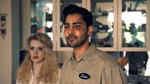Still of Tracy Mulholland and Manish Dayal in Fifteen Years Later (2018)