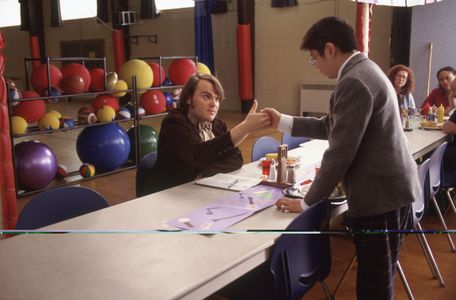 Jack Black and Robert Tsai in School of Rock (2003)