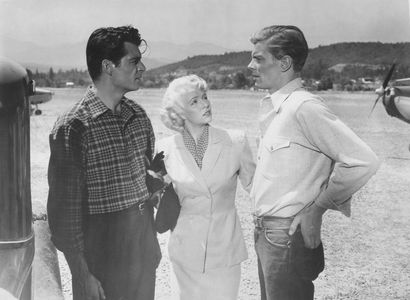Rory Calhoun, Peter Graves, and Ellye Marshall in Rogue River (1951)