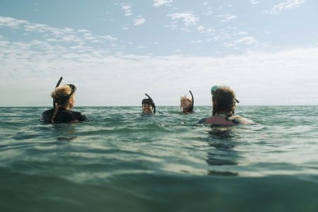 Saskia Archer, Kate Lister, Teressa Liane, and Ann Truong in The Reef: Stalked (2022)
