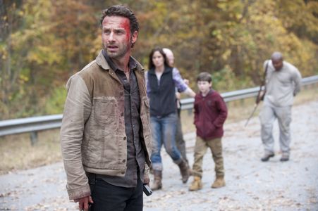 Andrew Lincoln, Sarah Wayne Callies, Irone Singleton, and Chandler Riggs in The Walking Dead (2010)
