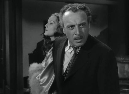 Hazel Brooks and George Coulouris in Sleep, My Love (1948)