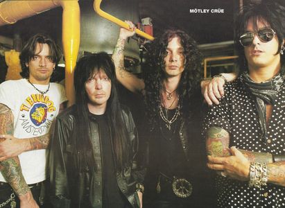 Tommy Lee, Nikki Sixx, Mick Mars, John Corabi, and Mötley Crüe