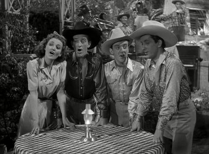 Mary Lou Cook, Joe McMichael, Judd McMichael, and Ted McMichael in Ride 'Em Cowboy (1942)