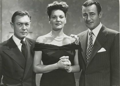 Tom Conway, Richard Cromwell, and Marjorie Hoshelle in Bungalow 13 (1948)