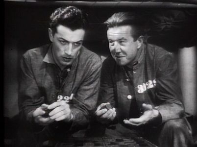 Robert Taylor and Al Hill in Buried Loot (1935)