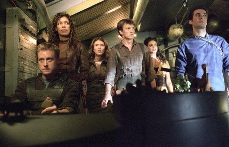 Nathan Fillion, Sean Maher, Jewel Staite, Gina Torres, Alan Tudyk, and Morena Baccarin in Serenity (2005)