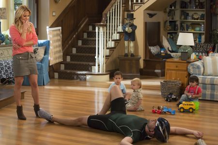 Candace Cameron Bure and John Brotherton in Fuller House (2016)