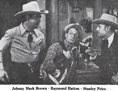 Johnny Mack Brown, Raymond Hatton, and Stanley Price in Raiders of the Border (1944)