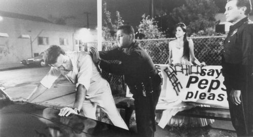 Edward James Olmos, Evelina Fernández, Ken Medlock, and Rolando Molina in American Me (1992)