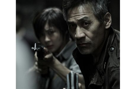 Sung-Ki Ahn and Ha Ji-Won in Sector 7 (2011)
