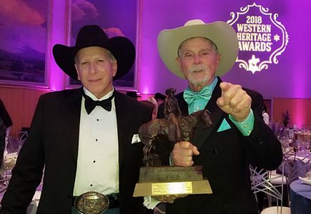 With Buck Taylor accepting Best Dramatic TV script Award for Taylor Sheridan (Yellowstone) at 2018 Western Heritage Awar