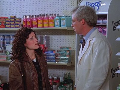 Julia Louis-Dreyfus and Peter Mehlman in Seinfeld (1989)