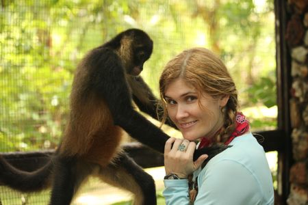 Natalia Reagan with a former pet spider monkey, Cantinflas outside of Pedasi, Panama.