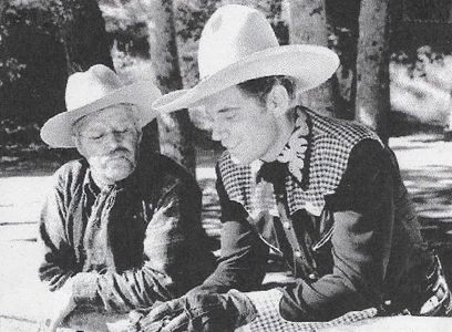 Harry Harvey and Fred Scott in Ridin' the Trail (1940)