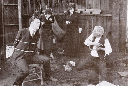 Charles Cummings, Ollie Kirby, Thomas G. Lingham, Marin Sais, and William H. West in The Strangler's Cord (1915)