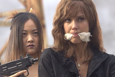 Jessica Alba and Cheryl Chin in Machete (2010)