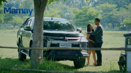 Antonio Aquitania and Erin Ocampo in Raising Mamay (2022)