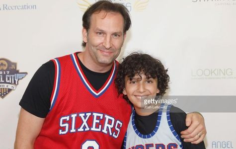Gunnar Sizemore and dad Kevin Sizemore at the Celebrity Wheelchair Basketball event at UCLA for the Angel City Games.
