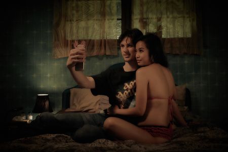 Lincoln Vickery and Nguyen Thi in Top of the Lake (2013)
