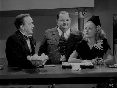 Oliver Hardy, Carol Andrews, and Stan Laurel in The Bullfighters (1945)