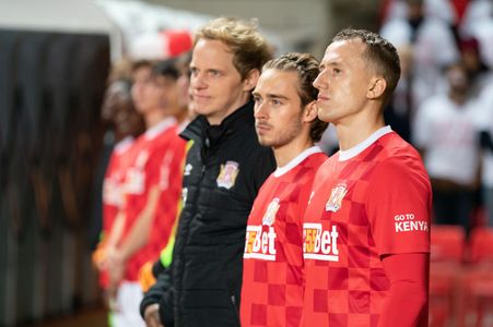 Chris Geere, Theo Barklem-Biggs, and Ossian Perret in The First Team (2020)